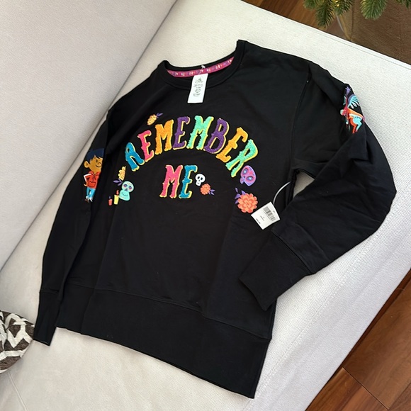 DISNEY COCO BLACK LONG SLEEVE EMBROIDERED REMEMBER ME TOP SMALL NEW - Picture 3 of 11